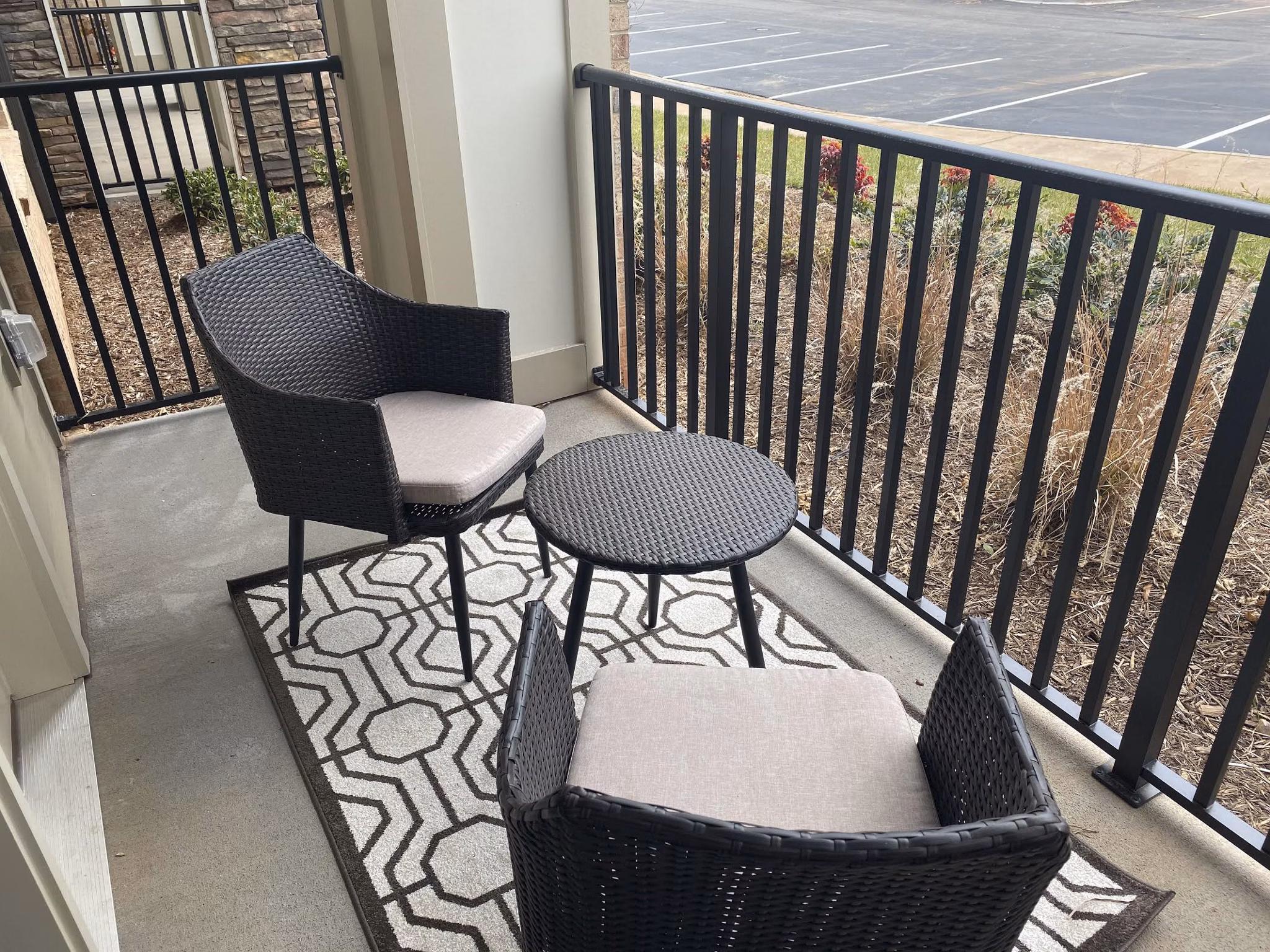 Private patio/balcony with scenic views at The Peak at Nichols Plaza Apartments