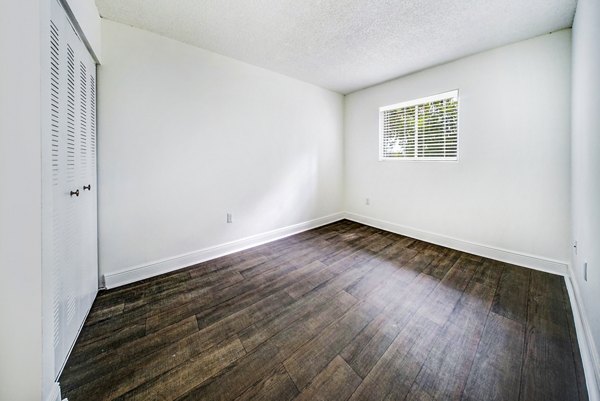 Spacious bedroom with modern decor at 7 West Apartments