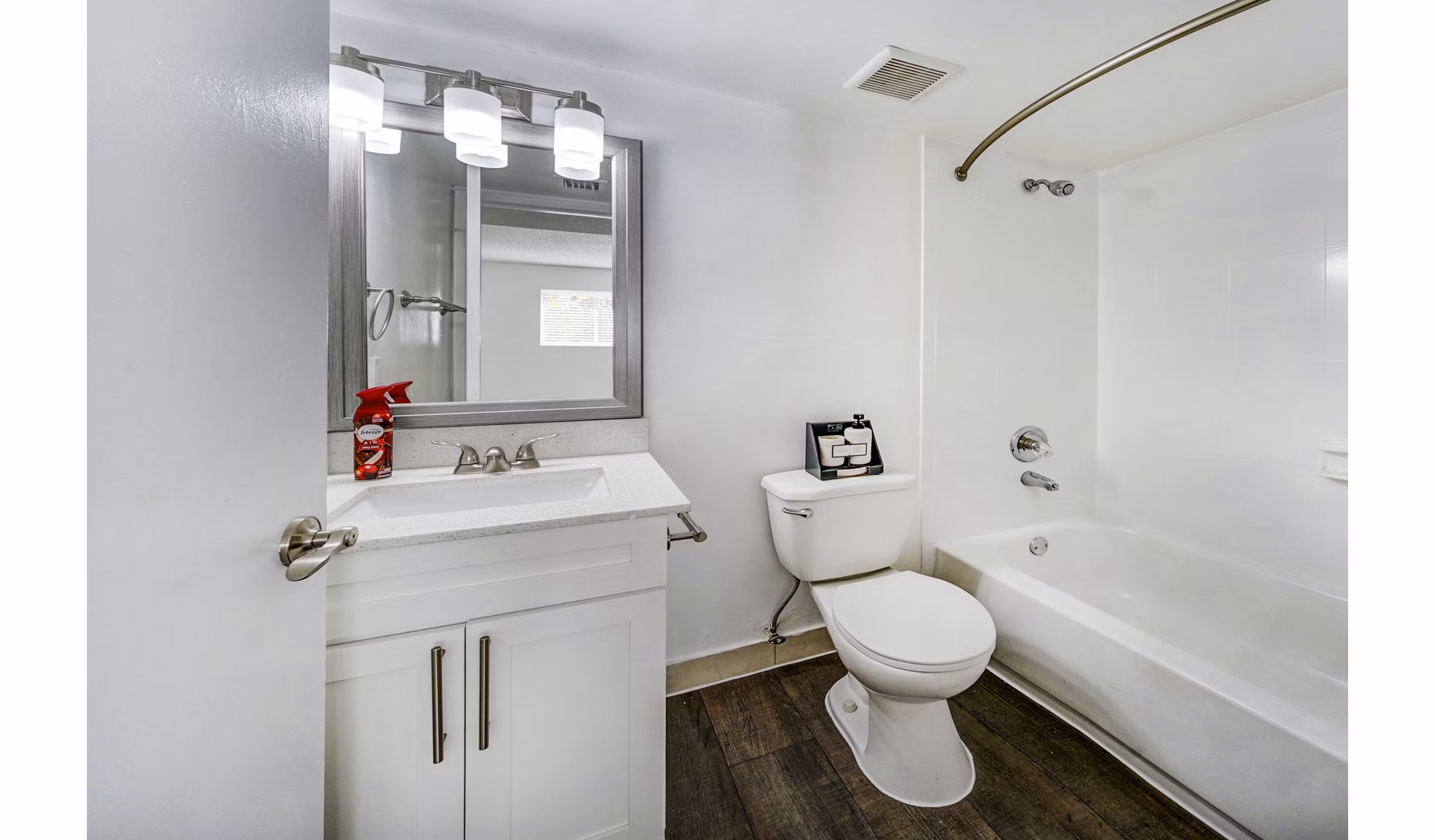 Modern bathroom featuring sleek fixtures at 7 West Apartments, luxury living space designed by Greystar