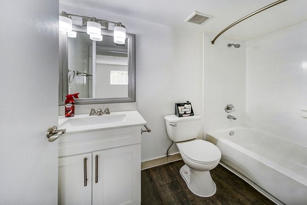Modern bathroom featuring sleek fixtures at 7 West Apartments, luxury living space designed by Greystar