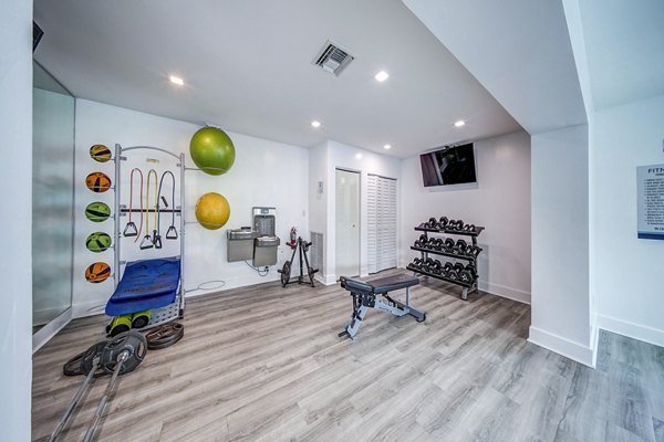 Fitness center with modern equipment at 7 West Apartments
