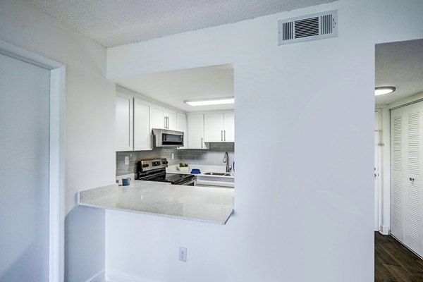 Luxurious kitchen with stainless steel appliances and modern finishes at 7 West Apartments