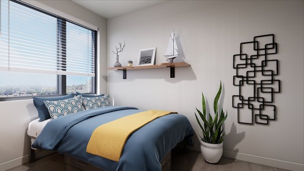 Bedroom with modern decor and natural light at Union Grantville Apartments, luxury living by Greystar