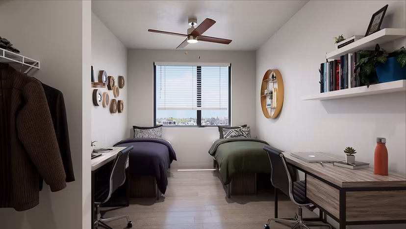 Cozy bedroom with modern decor at Union Grantville Apartments, featuring elegant furnishing for a luxurious living experience