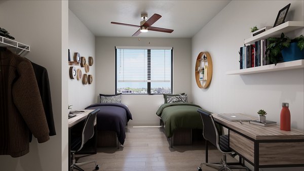 Cozy bedroom with modern decor at Union Grantville Apartments, featuring elegant furnishing for a luxurious living experience