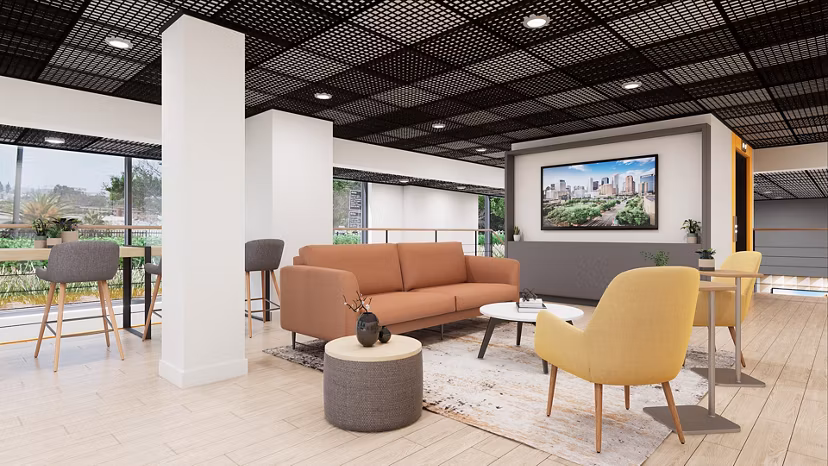 Clubhouse lounge with modern seating and decor at Union Grantville Apartments