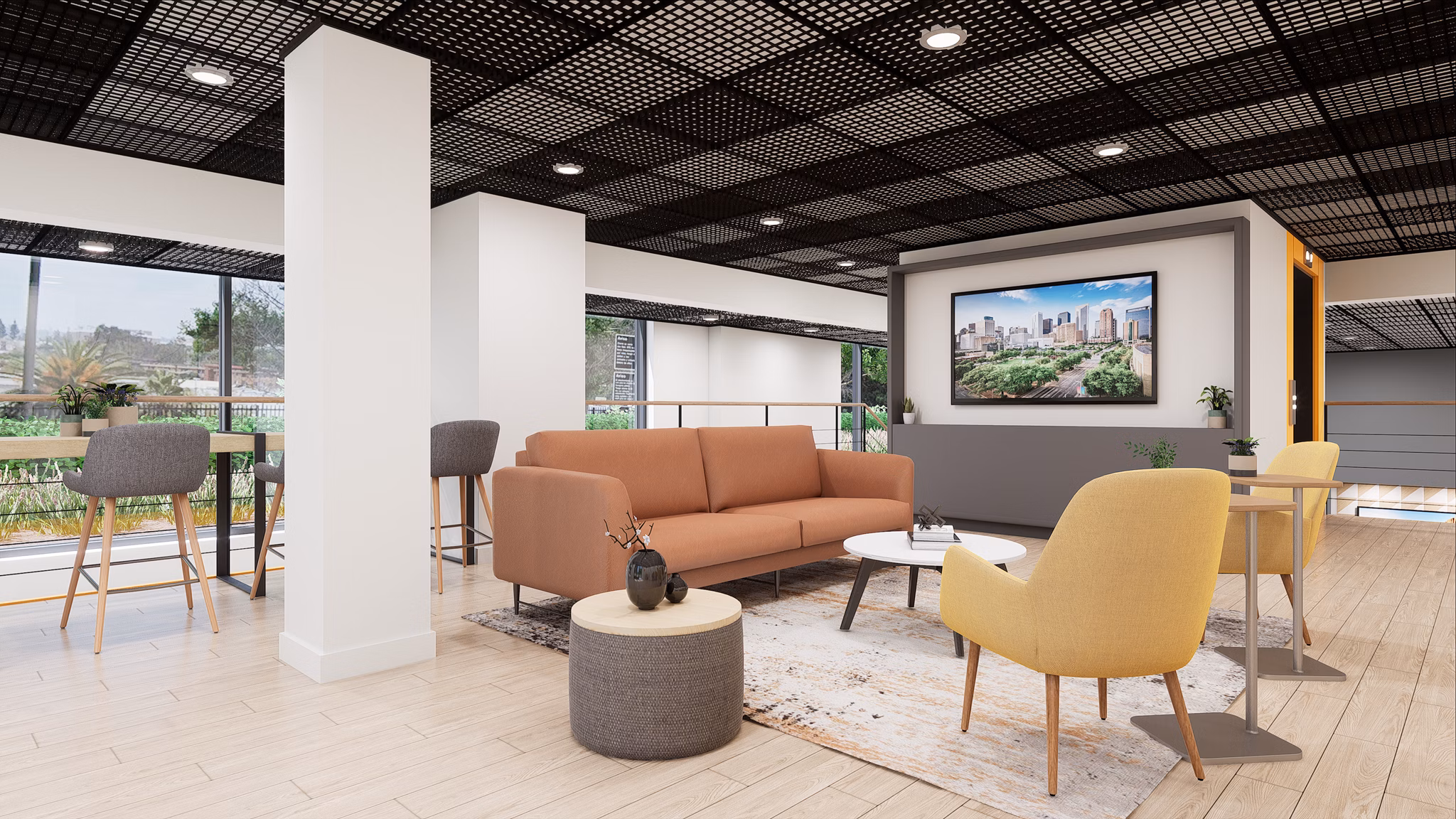 Clubhouse lounge with modern seating and decor at Union Grantville Apartments