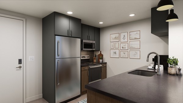 Kitchens with modern appliances at Union Grantville Apartments