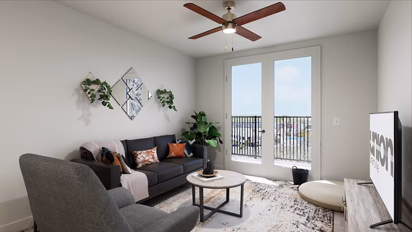 Open-concept living room with cozy seating and modern decor at Union Grantville Apartments
