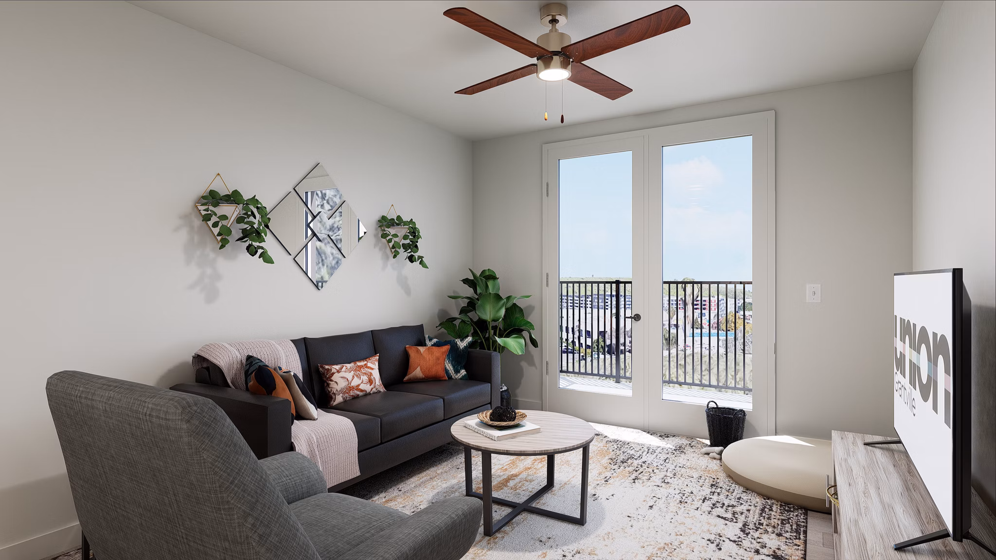 Open-concept living room with cozy seating and modern decor at Union Grantville Apartments
