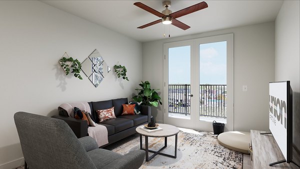 Open-concept living room with cozy seating and modern decor at Union Grantville Apartments