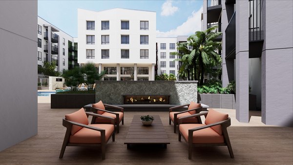 Fire pit surrounded by cozy seating at Union Grantville Apartments, perfect for luxury outdoor gatherings