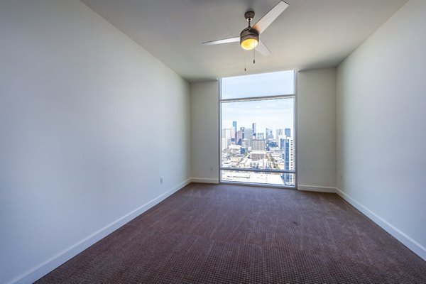 Modern bedroom with elegant decor at The Travis Apartments