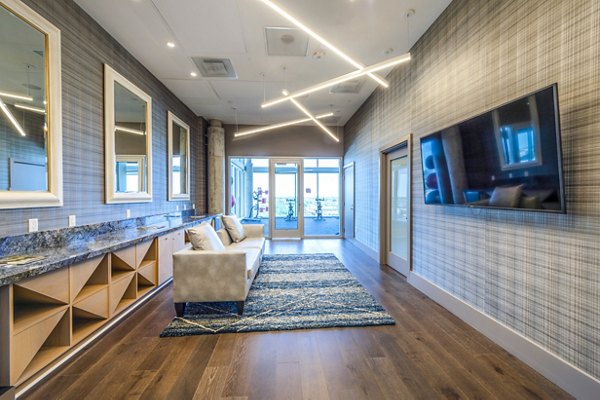 Yoga studio with modern equipment at The Travis Apartments, perfect for fitness enthusiasts in an inspiring environment