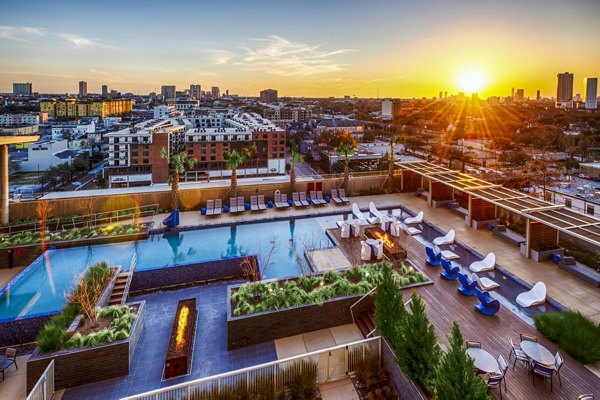 Modern fire pit and pool area at The Travis Apartments, Austin luxury living environment