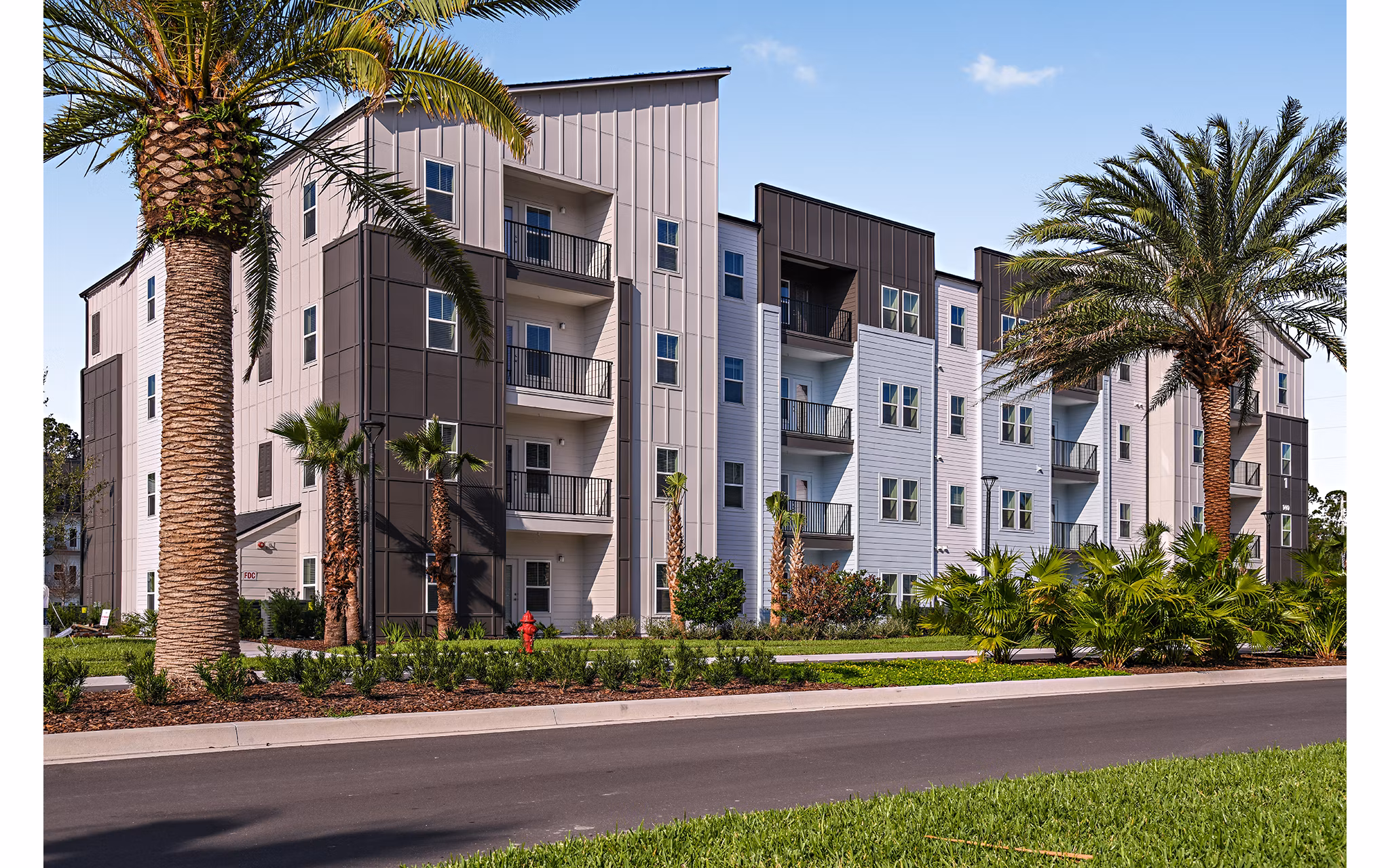 Grand Cypress Apartments: Luxury view of modern apartments in Wesley Chapel, highlighting elegant architectural design and scenic surroundings
