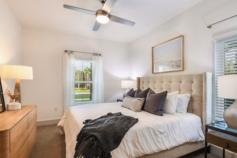 Spacious bedroom with modern decor at Grand Cypress Apartments