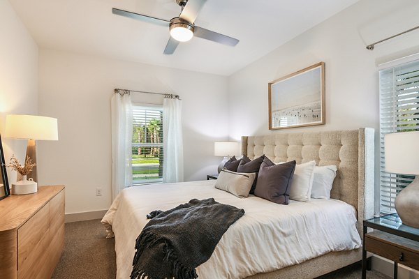 Spacious bedroom with modern decor at Grand Cypress Apartments