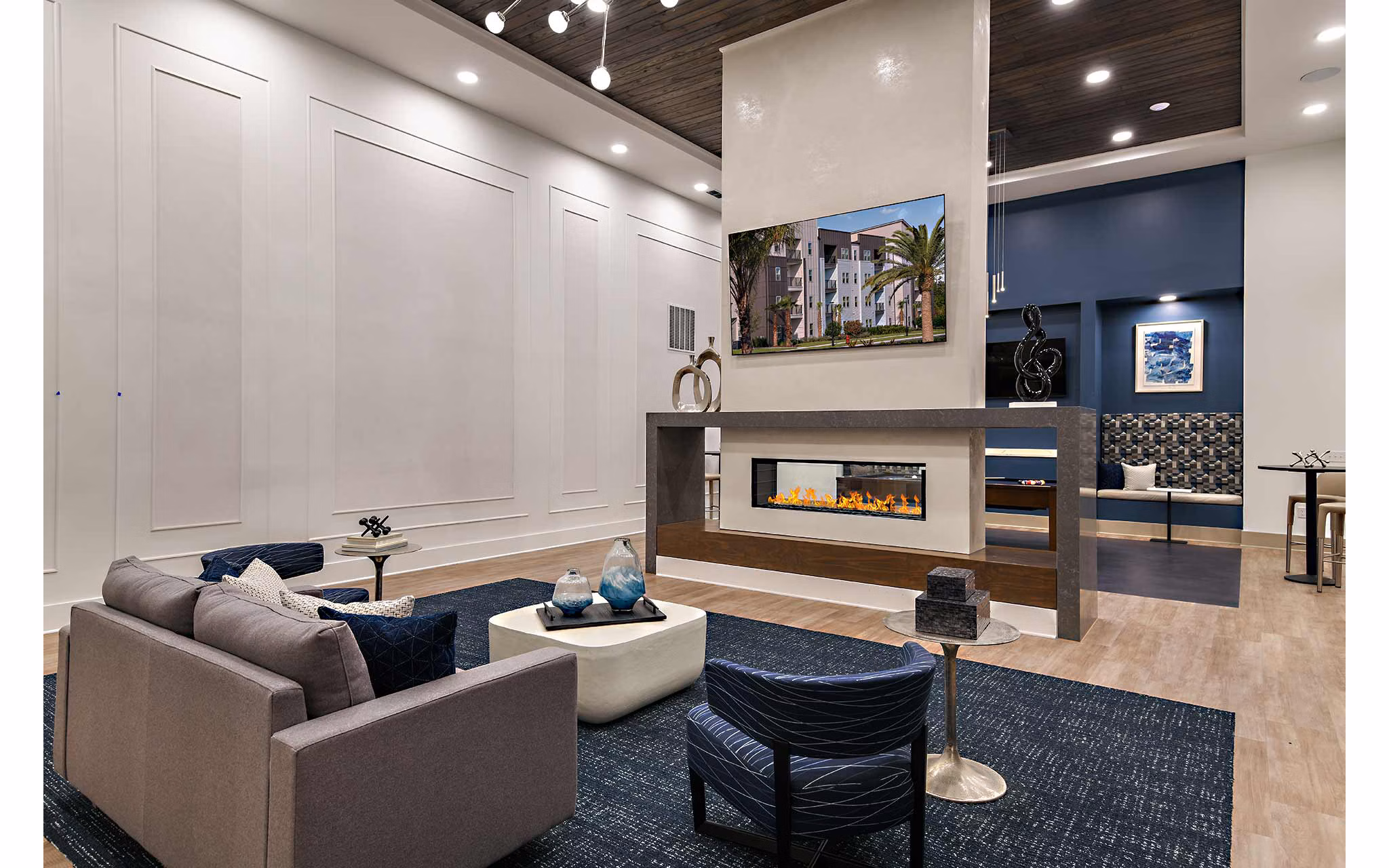 Stylish clubhouse with plush seating at Grand Cypress Apartments, a feature of luxury living
