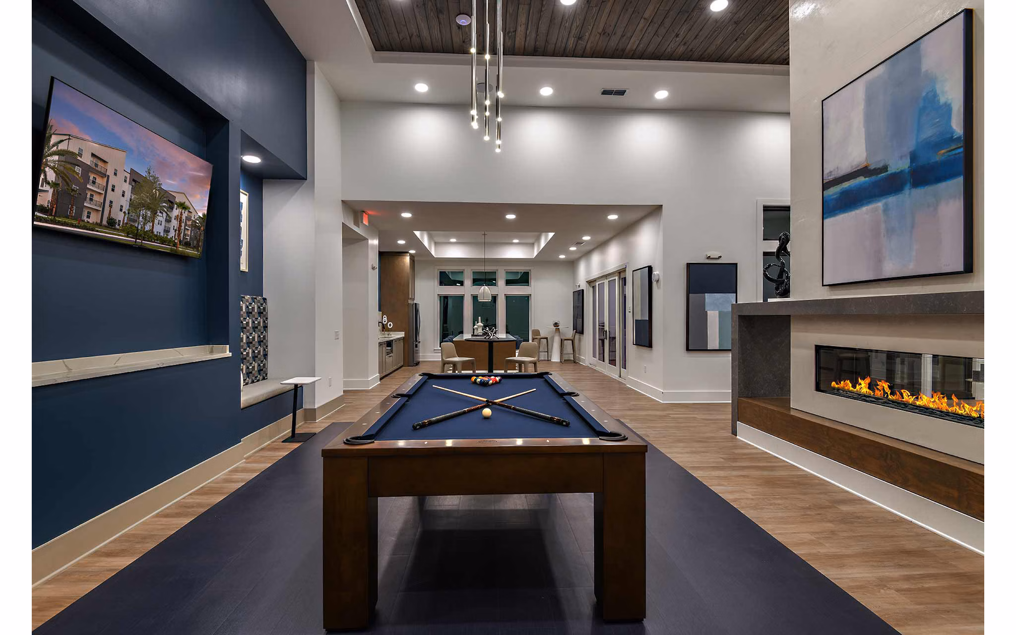 Clubhouse featuring modern design and spacious seating at Grand Cypress Apartments