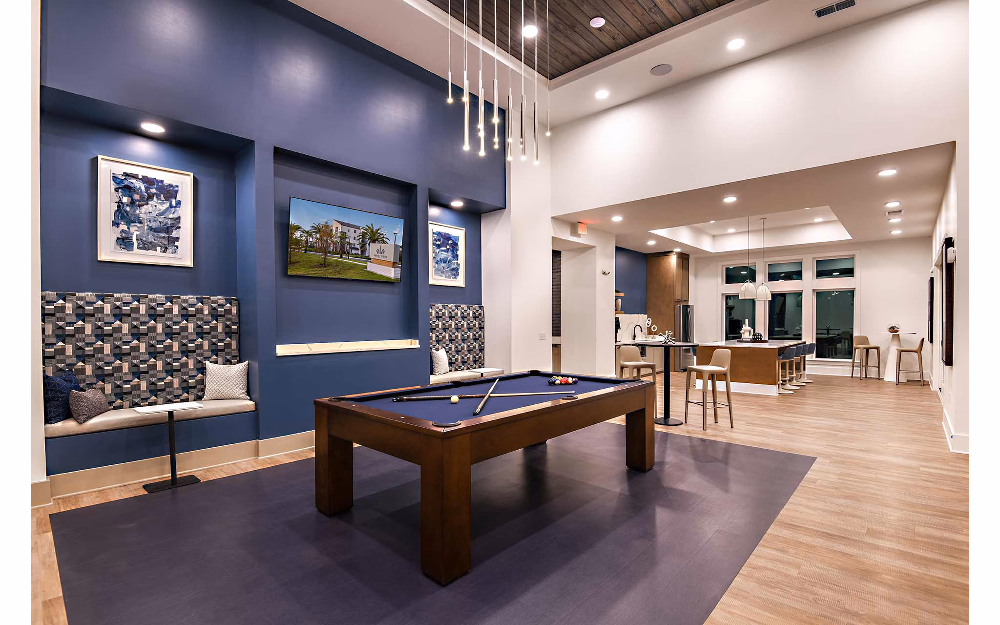 Spacious clubhouse with modern decor at Grand Cypress Apartments, featuring luxurious social and event spaces
