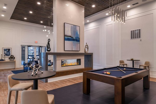 Elegant clubhouse with cozy seating and modern design at Grand Cypress Apartments