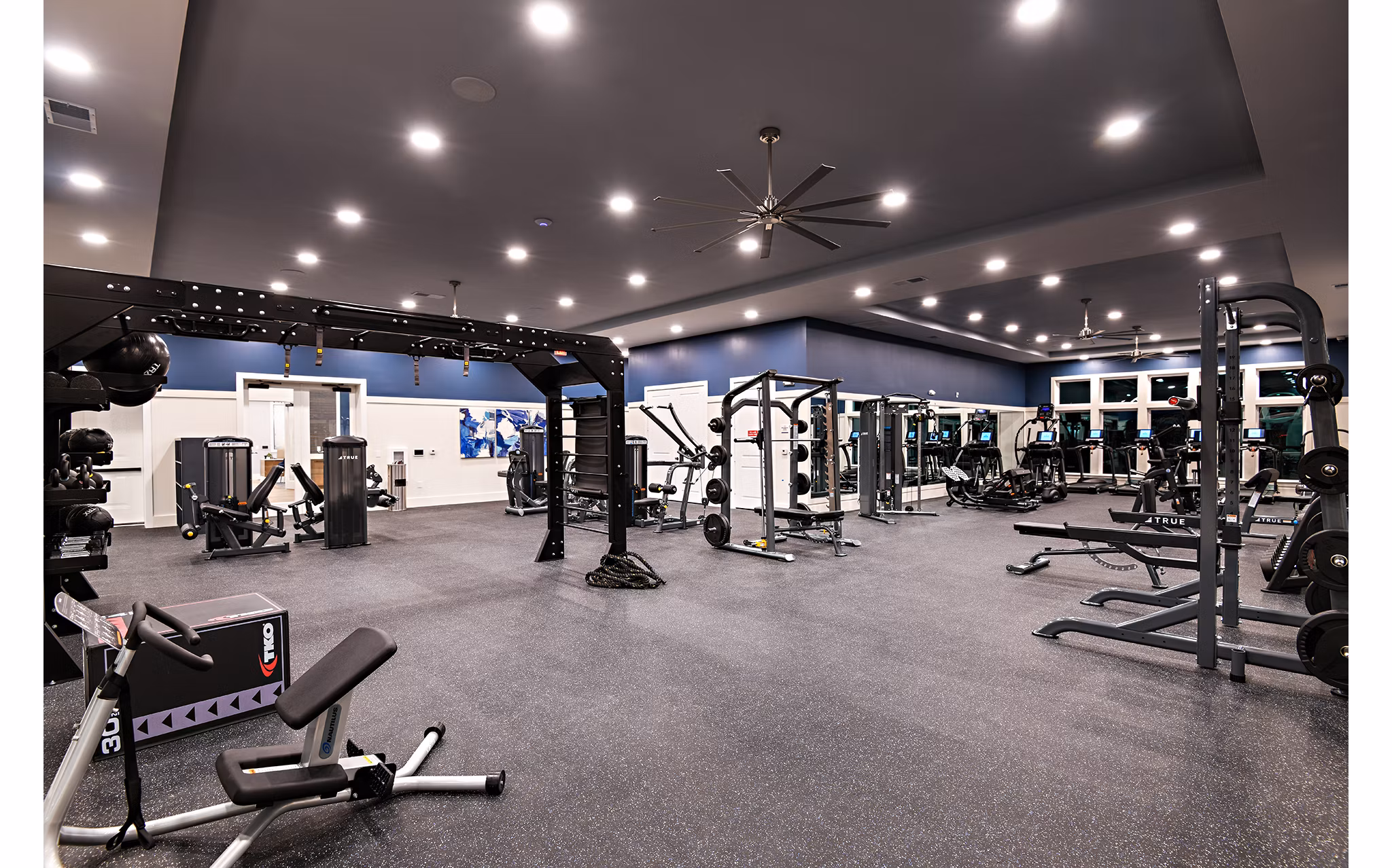 State-of-the-art fitness center with advanced equipment at Grand Cypress Apartments for a healthy lifestyle