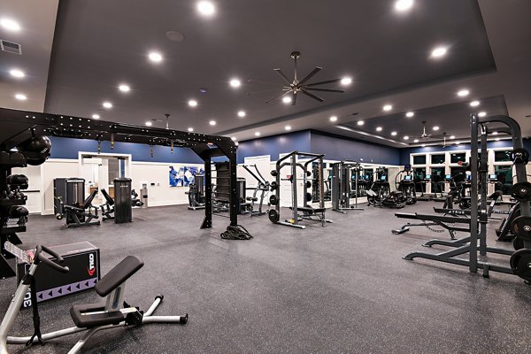 State-of-the-art fitness center with advanced equipment at Grand Cypress Apartments for a healthy lifestyle