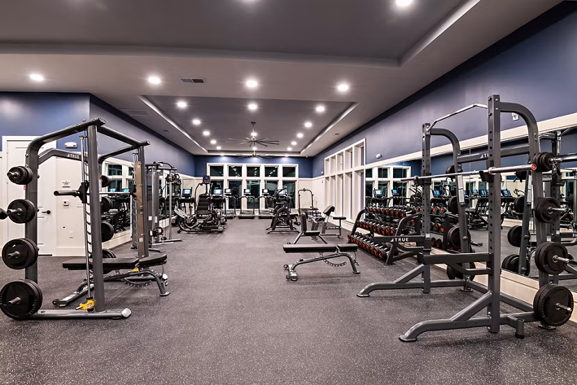 State-of-the-art fitness center with modern equipment at Grand Cypress Apartments, ideal for an active lifestyle