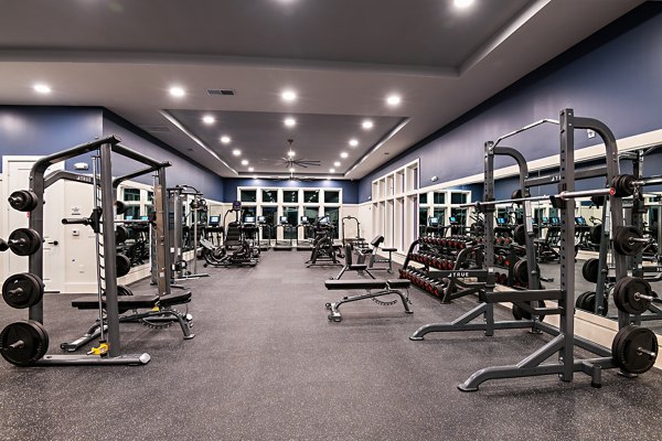 State-of-the-art fitness center with modern equipment at Grand Cypress Apartments, ideal for an active lifestyle