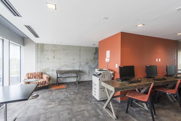Modern clubhouse featuring luxurious seating and entertainment areas at Evo at Cira Centre South Apartments in Philadelphia