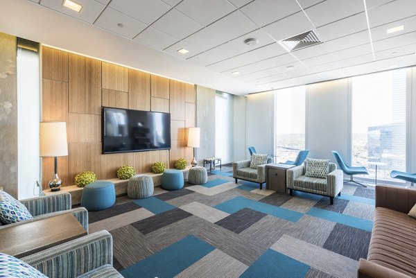 Modern clubhouse with sleek furnishings at Evo at Cira Centre South Apartments, featuring luxury amenities in Philadelphia