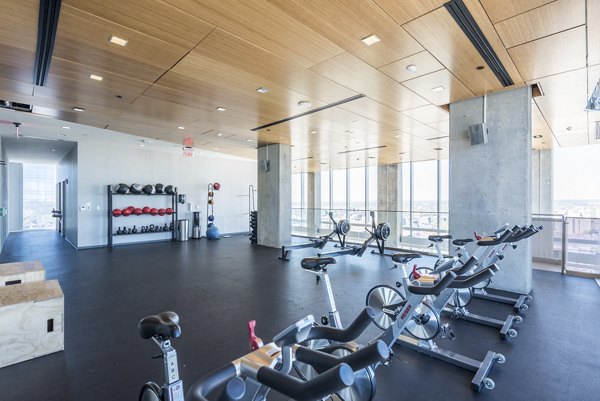 Modern fitness center with state-of-the-art equipment at Evo at Cira Centre South Apartments