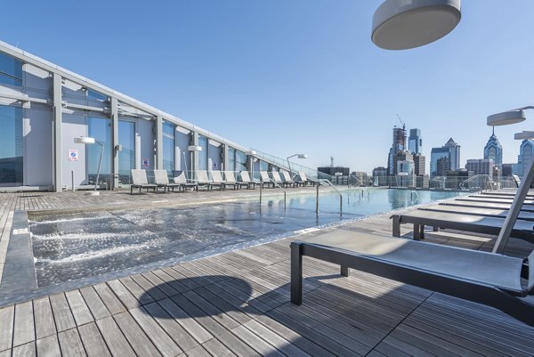 Sparkling outdoor swimming pool at Bay Court Luxury Apartments in Harbour Pointe, ideal for relaxation and recreation