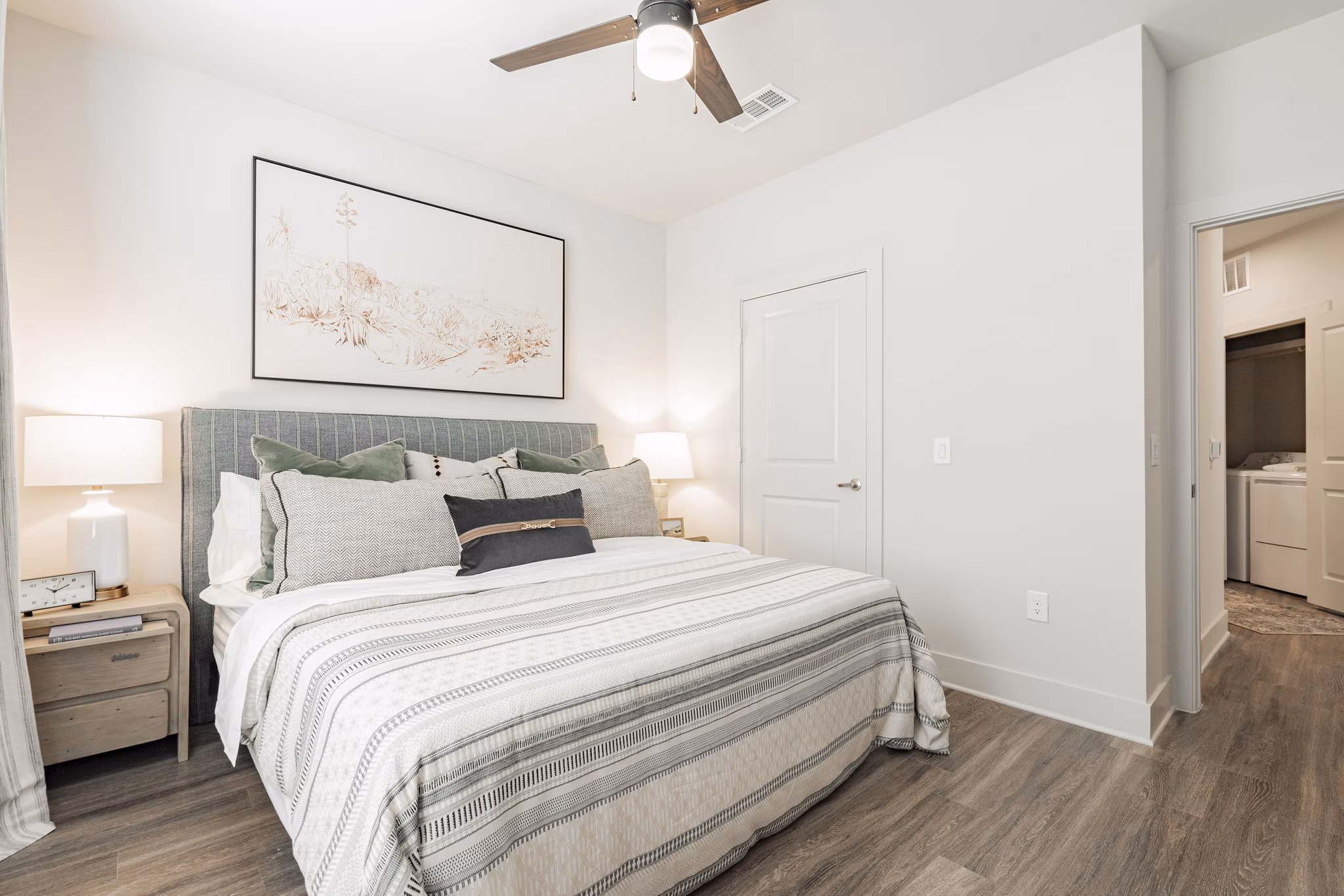 Cozy bedroom featuring modern decor at The Lyric at Keller Center Stage Apartments