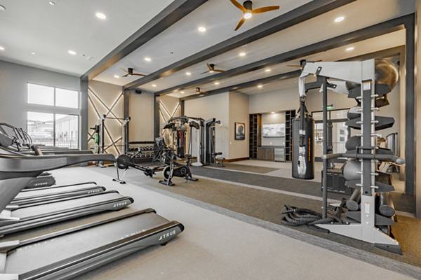 fitness center at The Lyric at Keller Center Stage Apartments