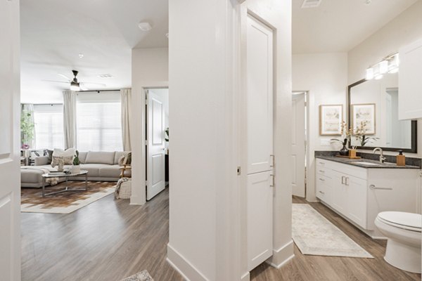 Hallway featuring modern lighting and stylish decor at The Lyric at Keller Center Stage Apartments