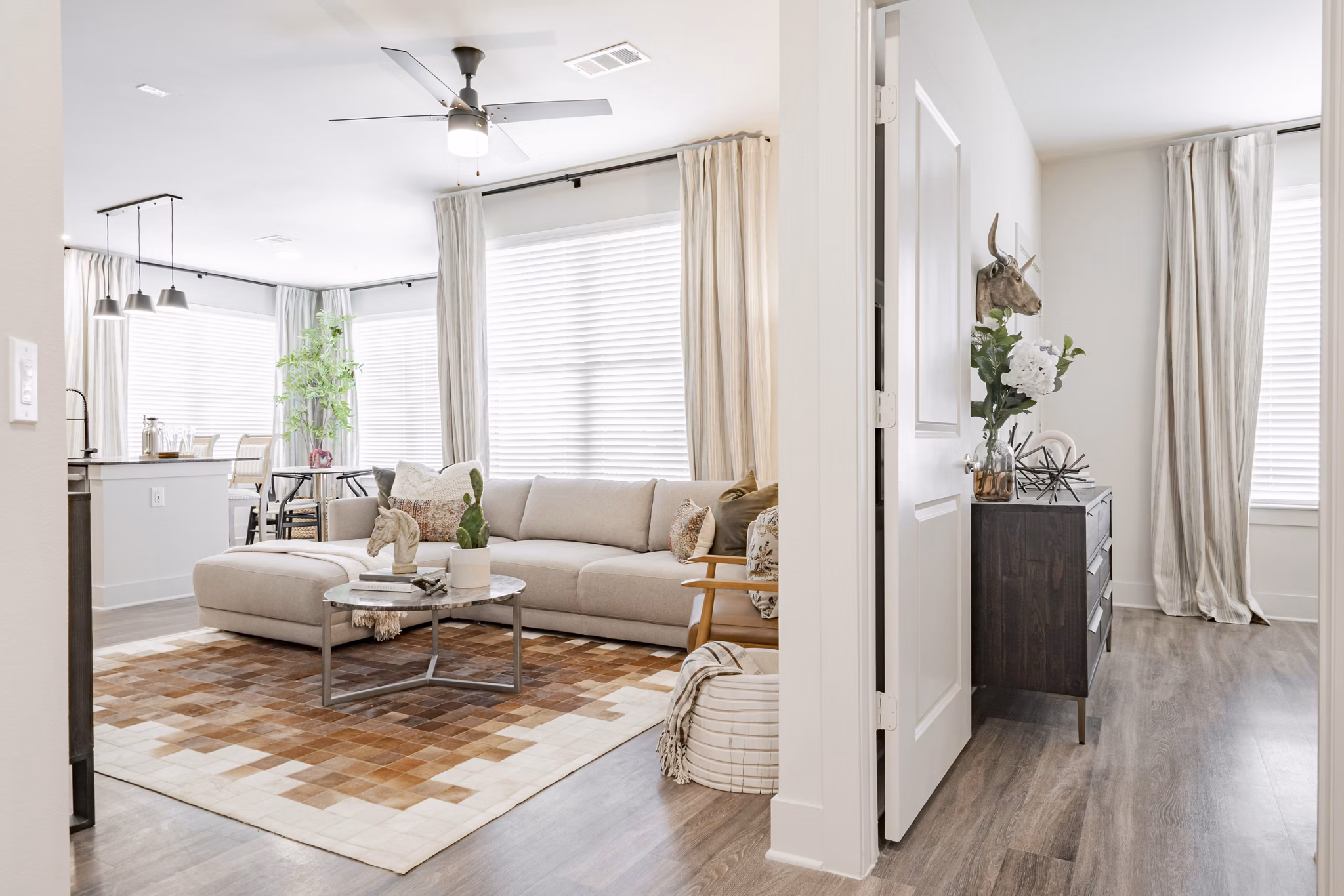 Cozy kitchen with stainless steel appliances at The Lyric at Keller Center Stage Apartments