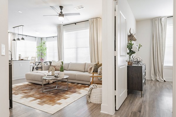 Cozy kitchen with stainless steel appliances at The Lyric at Keller Center Stage Apartments