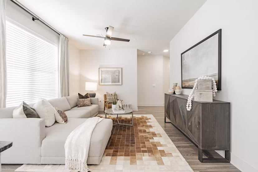 Spacious living room featuring modern decor at The Lyric at Keller Center Stage Townhomes