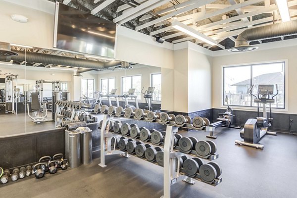 Modern fitness center with state-of-the-art equipment at North Hill Apartments