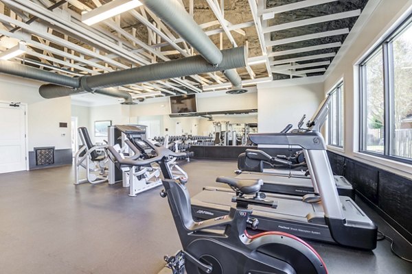 Modern fitness center with state-of-the-art equipment at North Hill Apartments