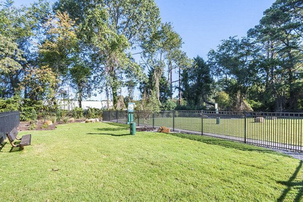 Leash-free dog park for pet-friendly living at North Hill Apartments, perfect for residents seeking outdoor spaces for their furry friends