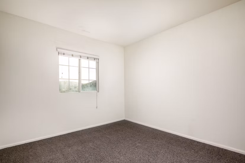 Cozy bedroom with modern decor at Jackson Pointe 111 Apartments