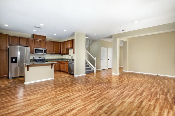 Modern living room with stylish furnishings and natural light at Jackson Pointe 111 Apartments