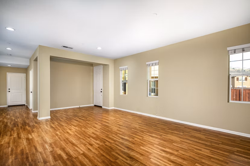 Contemporary living room with modern furnishings at Jackson Pointe 111 Apartments
