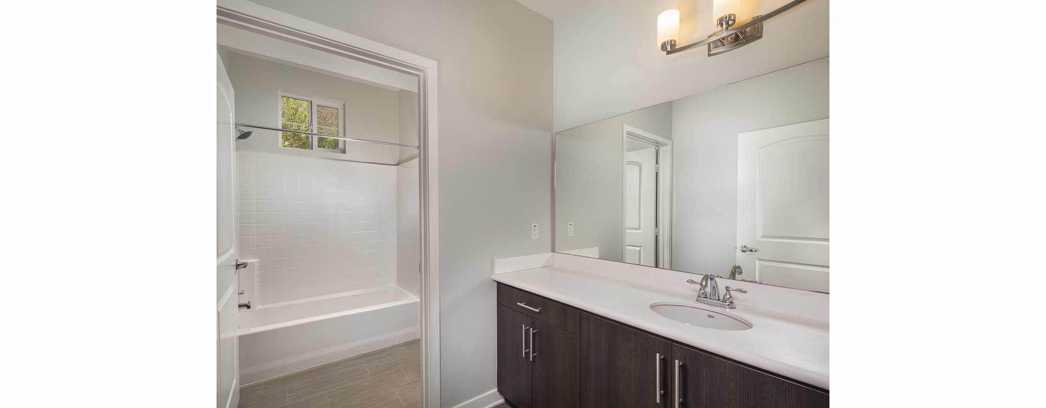 Bathroom showcasing sleek fixtures and modern design at Lakeview 88 Apartments