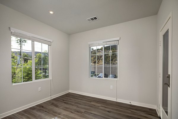 Dining area featuring modern dÃ©cor and seating at Lakeview 88 Apartments in a luxury setting