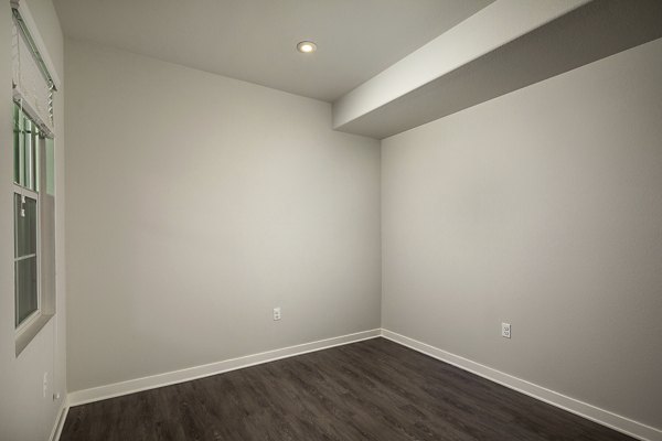 Modern dining area with elegant lighting and contemporary furnishings in Lakeview 88 Apartments