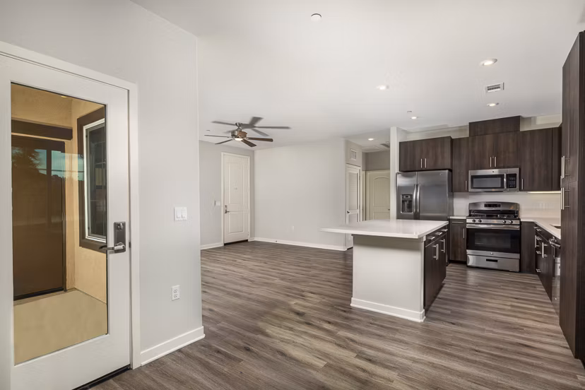 Spacious kitchen with modern appliances and island at Lakeview 88 Apartments